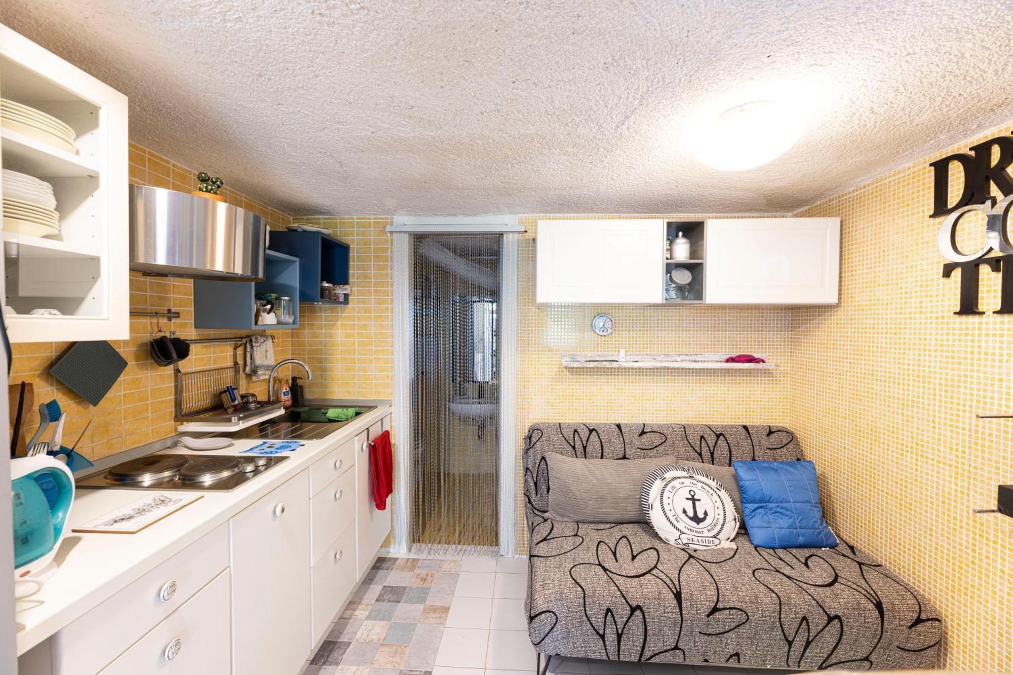 I Chioppi 4 - Goelba Apartment กาโปลิเวรี ภายนอก รูปภาพ